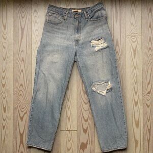 Levi's ‘94 baggy distressed blue jeans.